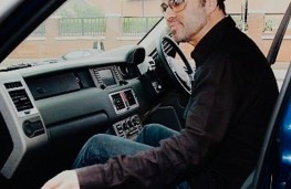 George Michael, sitting in Range Rover